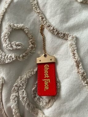 Gold red ghostface keychain